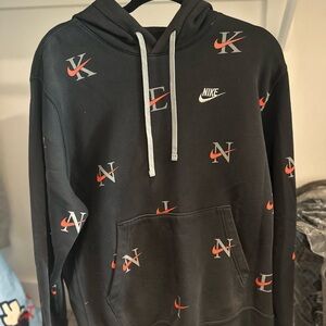 Nike Black Hoodie with Red and White Logo Pattern